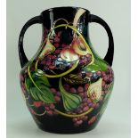 Moorcroft Prestige Queen's Choice twin handled vase, 34cm tall. Designed by Emma Bossons.