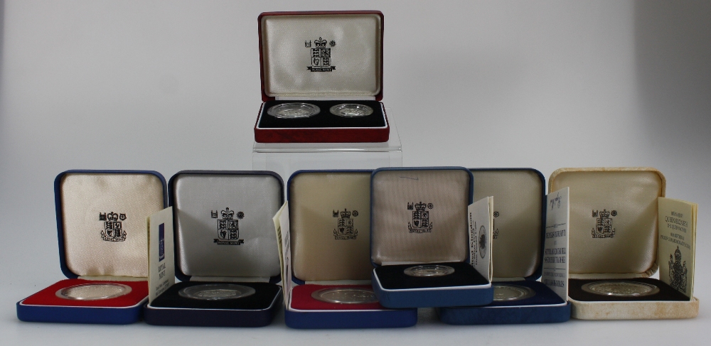 A collection of Royal Mint proof silver coins to include Kingdom of Lesotho crown,