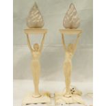 Pair of decorative painted metal lamps cast as nude lady holding up bowl with the flame as glass