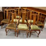 Ten 20th Century Oak Dining chairs including one Carver chair on Queen Anne Legs