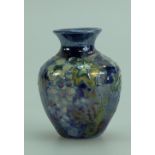 Lise B Moorcroft art pottery lustre miniature vase decorated with grape & leaf design,