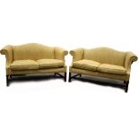Two Upholstered roll top golden two seater sofa's on mahogany frames