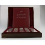 A collection of Silver ingots "Elizabeth our Queen" comprising 25 silver ingots each decorated with