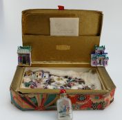 A collection of Japanese miniature ceramic items including Homes, Bridges, People,