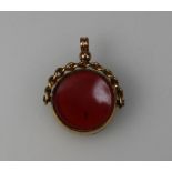 Victorian 18ct gold reversable pendant with green and red coloured stone