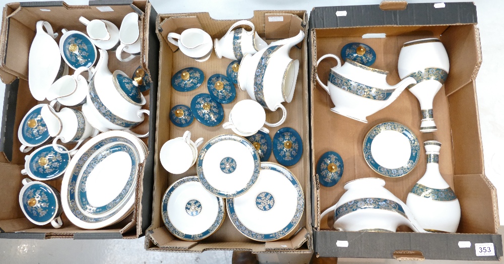 A large collection of Royal Doulton Carlyle pattern dinner and teaware to include gravy boats,