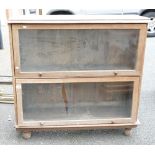 1930's Oak 2 tier stacking bookcase in need of repair.