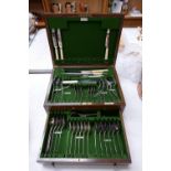 Oak cased cutlery canteen with contents.