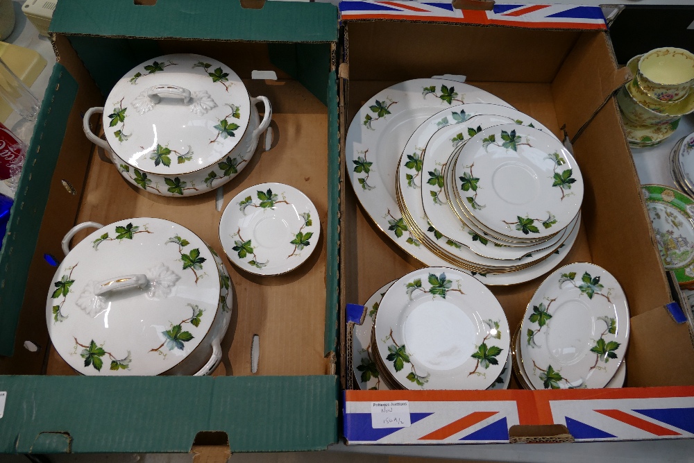 A collection of Crown Staffordshire floral teaware to include large serving platter, dinner plates,