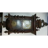 19th Century walnut Vienna wall clock with horse top.