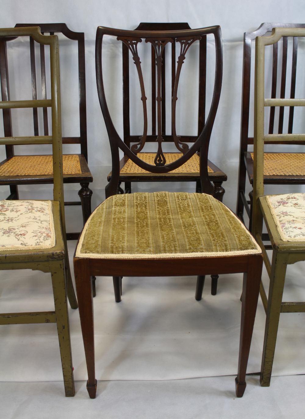 Six Edwardian non matching dining chairs