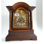 Victorian walnut mantle clock with decor
