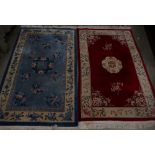 2 similar red and blue oriental patterne