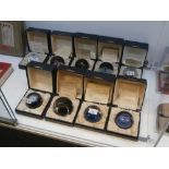 9 Boxed Caithness paperweights