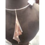 Contemporary silver chocker with geometric pendant inspired by Concorde inset with garnets signed