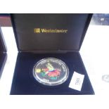 Cased 1995 5oz 25 crown silver proof coin decorated with a humming bird