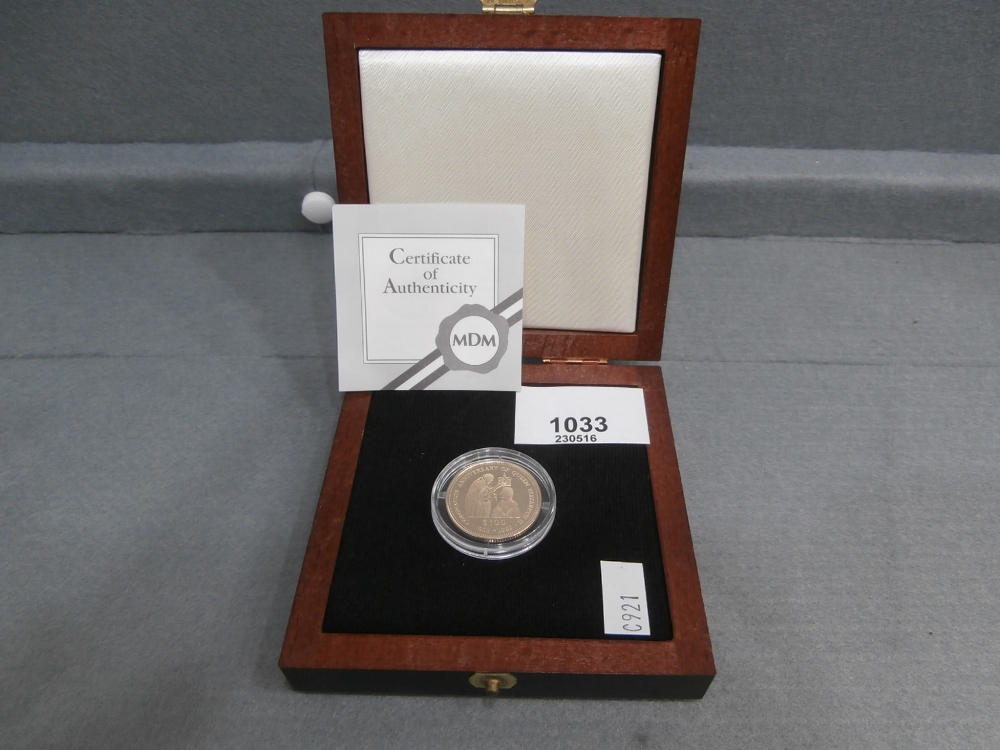 Cased 1993 Tuvalu 100 Dollar 14ct gold coin