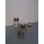 3 Silver topped bottles and scent bottle with silver bottle