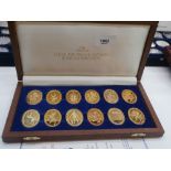 Cased set 12 oval silver gilt ingots The Arms of Prince Andrew and Sarah Ferguson