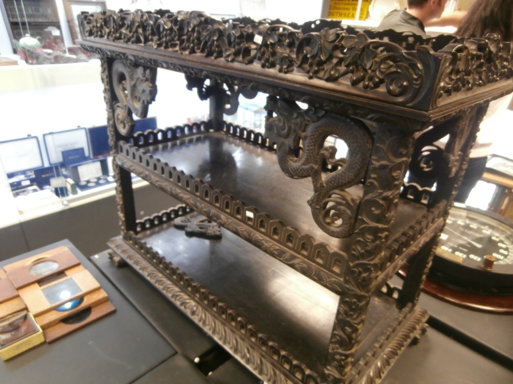 19th Century Chinese 3 tier carved rosewood buffet with pierced galleries, dragon detail and claw