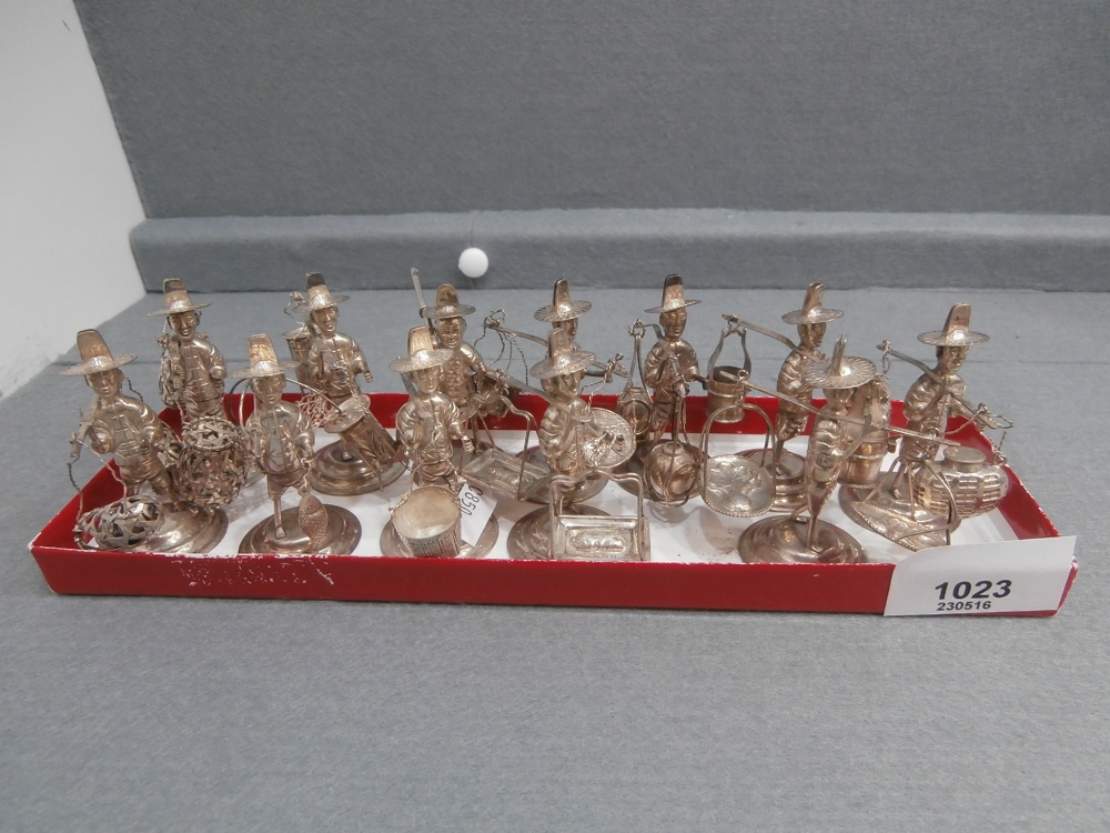 Set 12 sterling silver place name holders in the form of Far Eastern market tradesmen