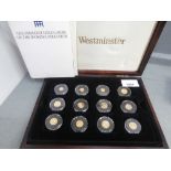 Cased collection of 12 24ct small gold coins of the World