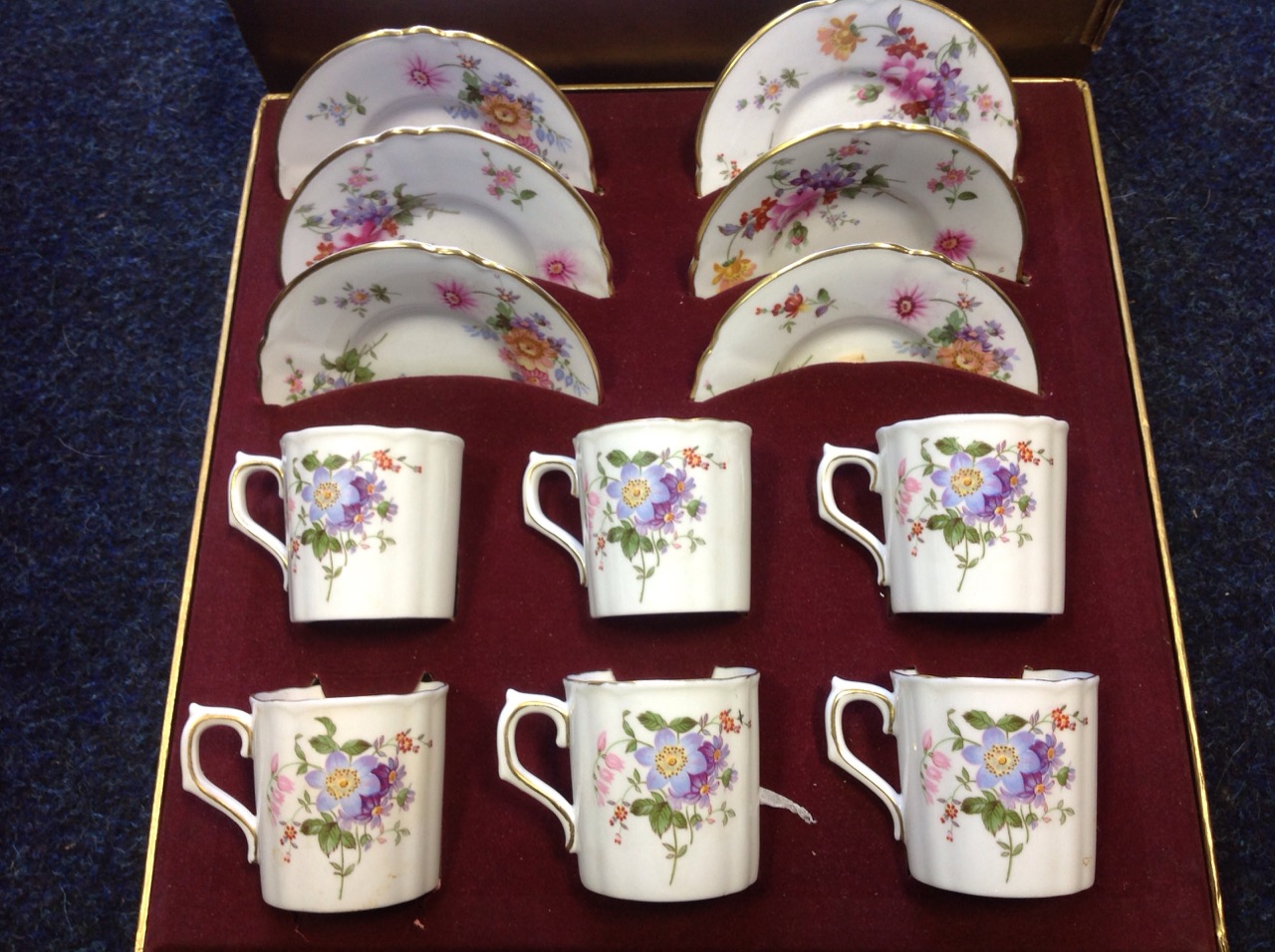 A boxed Royal Crown Derby six-piece teaset, the cups and saucers with gilt rims decorated in the - Image 2 of 3