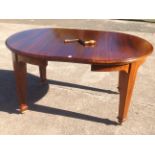 A nineteenth century mahogany telescopic extending dining table.