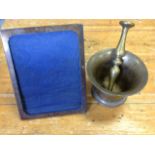 A London hallmarked rectangular silver picture frame; and an antique brass pestle & mortar. (2)