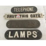 Four cast iron railway signs, the rectangular panels with raised lettering - Telephone, Shut This