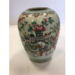 A large nineteenth century Chinese famille verte vase depicting traditional garden flowers and