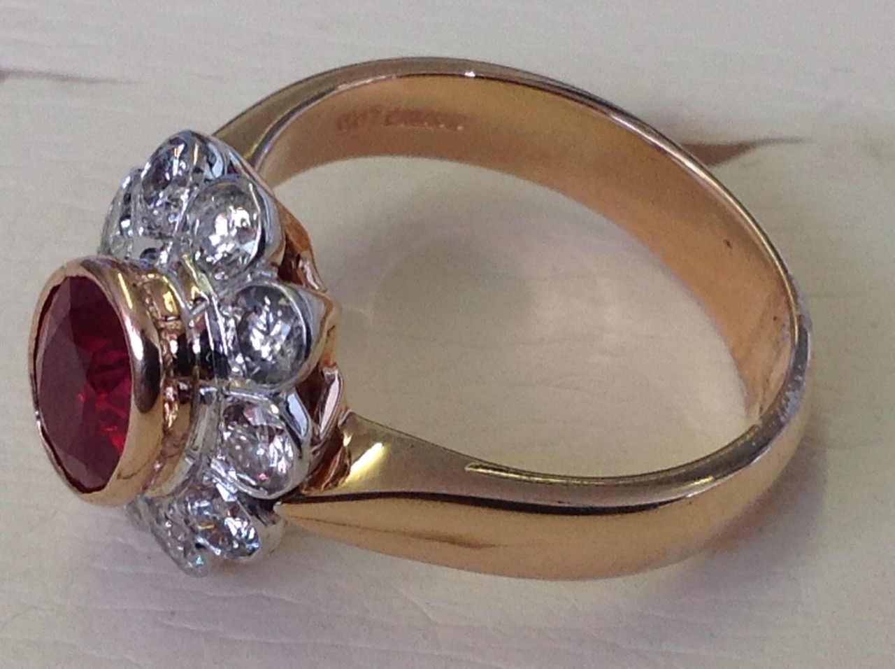 A hallmarked 18ct rose gold ruby & diamond ring, the oval bezel set ruby of over one-and-a-half - Image 3 of 3