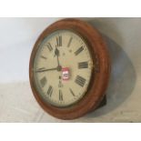 A NER oak cased station clock from Ilderton Station, the moulded case with brass bezel having