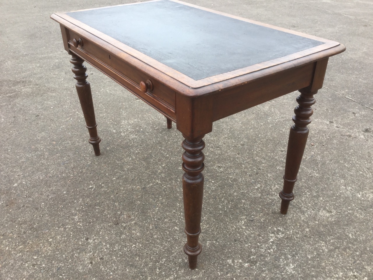 A Victorian mahogany writing table, having moulded skiver top above a panelled frieze drawer, - Image 2 of 3