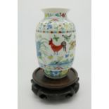 A Chinese doucai chicken vase of ovoid form having moulded rim with six character Chenghua mark to