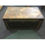 A nineteenth century leather mounted trunk, the box with brass studding having original lock,