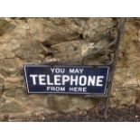 A twin sided enamelled sign in blue & white, on scrolled wrought iron bracket mount - You May
