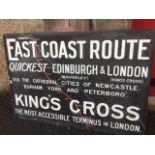 A milk glass sign advertising the east coast route from Kings Cross to Waverley - designed to be