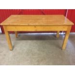 A Victorian Irish pine school table, with rectangular plank top on square column legs. (29.5in x