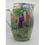 A nineteenth century Canton Chinese export cider jug decorated in the famille rose palette,
