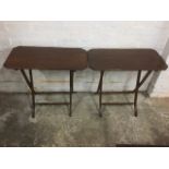 A pair of folding late Victorian occasional tables, the rectangular moulded tops with canted corners