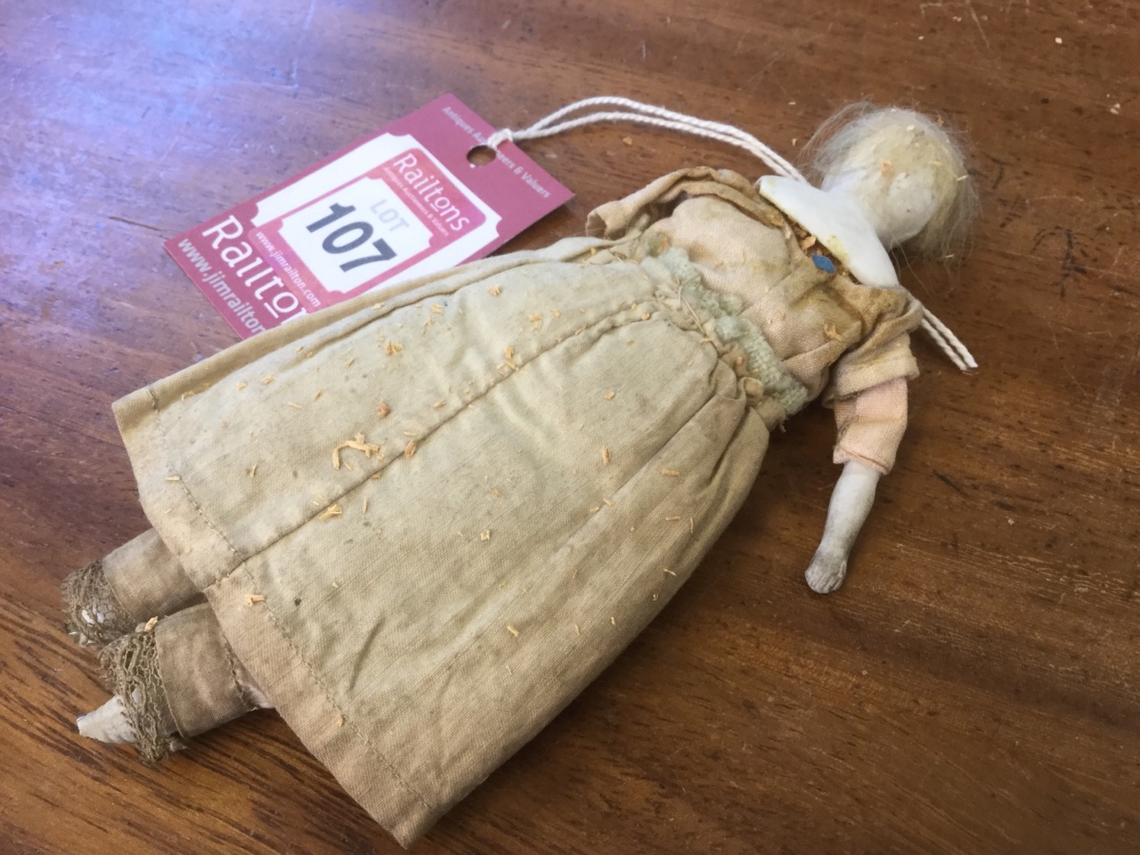 An early nineteenth century doll, with hand-painted porcelain head on sawdust stuffed body, - Image 3 of 3