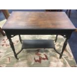 A Victorian ebonised centre table, the rectangular moulded top above reeded frieze mounted with