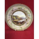 A nineteenth century Irish porcelain plate handpainted with scene of Barmouth harbour in