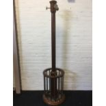 A nineteenth century circular mahogany coatstand, having turned barrel column with hexagonal capital