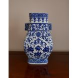 A large Chinese blue & white 'hu' vase with Qianlong blue seal mark to base, the vessel of square