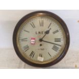 A LNER wallclock by Reid & Sons, the enamelled dial with roman chapters having brass bezel and