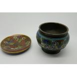 A nineteenth century Chinese bowl with chanelled neck and flat rim, raised on moulded base,