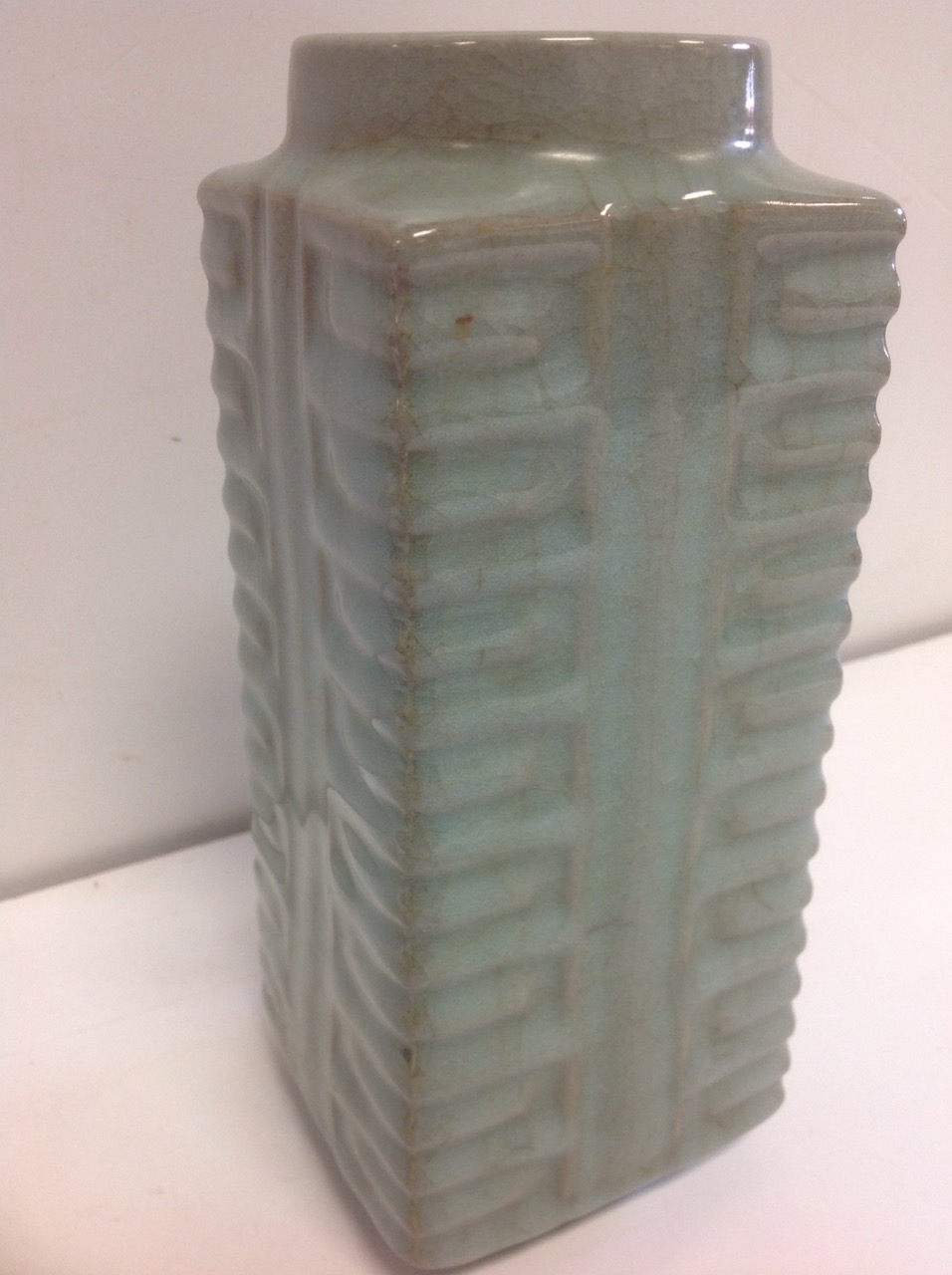 A square Chinese stoneware celadon glazed vase, with circular rim above a ribbed body, decorated - Image 2 of 3