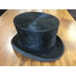 A boxed Lock & Co top hat.